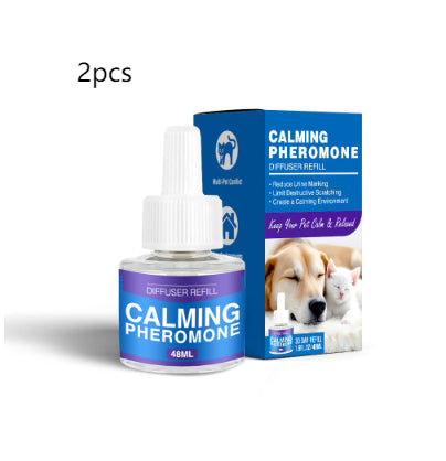 Cat Calming Pheromone Diffuser Kit with a white plug-in diffuser and a green refill bottle, next to its green and white box. - Image 27