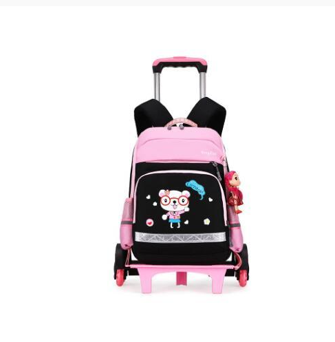 Pink and black detachable trolley backpack for elementary school students with a cartoon bear graphic and doll charm. - Image 4