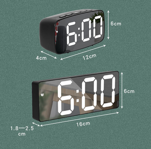 Modern rectangular digital alarm clock with a mirrored face and large, colorful LED numbers displaying the time. - Image 18