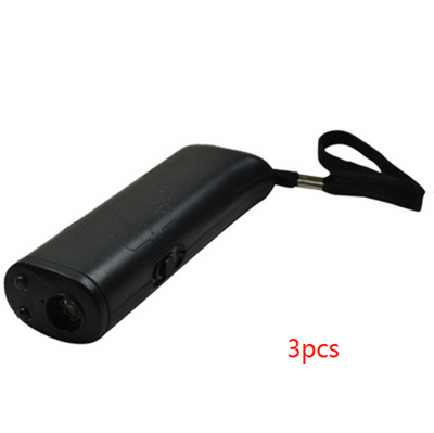 Yellow and black ultrasonic dog training devices with wrist straps, one in retail packaging. - Image 14
