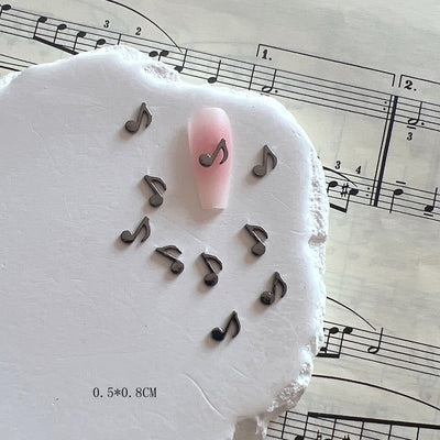 Accesorios de Uñas Metálicos con Símbolos Musicales - Image 7