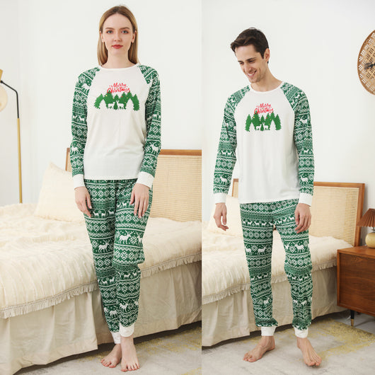 Family of three wearing matching white and green Christmas pajamas with reindeer and "Merry Christmas" text. - Image 8