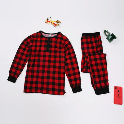 Red and black plaid long-sleeve family pajamas, including adult, child, and baby sizes, with festive accessories. - Image 4