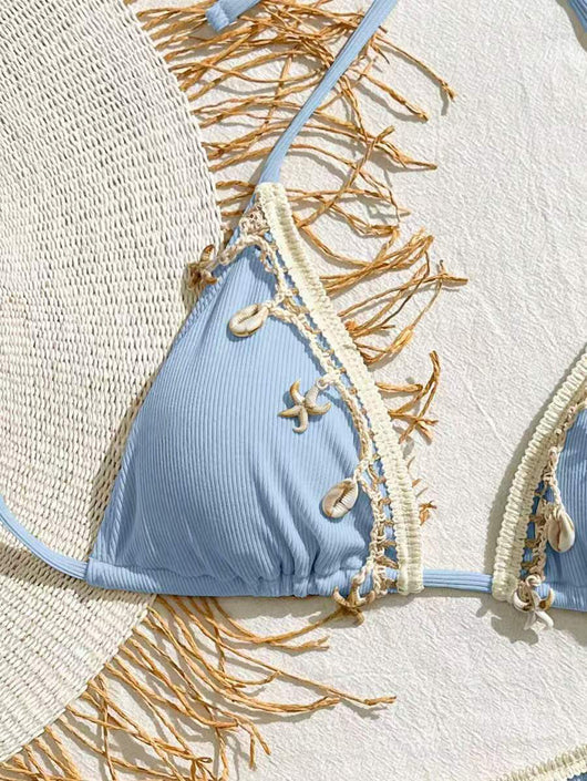 Light pink ribbed halterneck bikini with triangle cups and tie-side bottom, adorned with shell and starfish charms. - Image 20