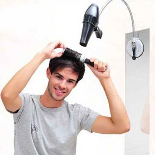 Hands-free hair dryer holder with a flexible silver gooseneck arm and a black suction cup base, holding a black hair dryer. - Image 5