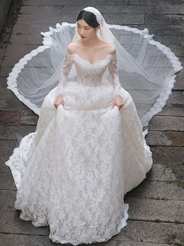 Vestido de Novia con Encaje Trailing y Mangas Largas Hombro Descubierto