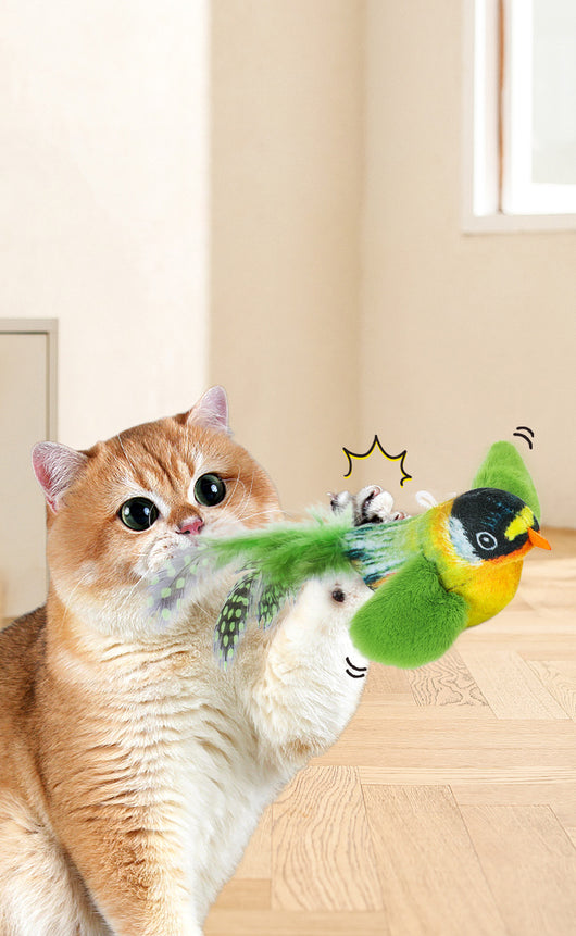 Colorful bird cat toy with green fluffy wings, black head, yellow face, orange beak, and spotted tail feathers. - Image 18