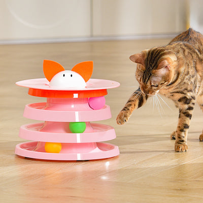Brown tabby cat sniffing a black and orange multi-level rotating cat plate toy with colorful balls and bunny ears. - Image 7