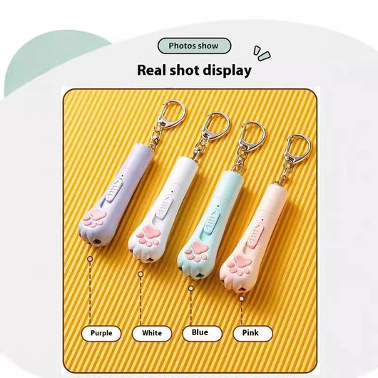Pink cat paw pen light toy with red laser, UV light for urine detection, and white LED illumination, featuring a keychain. - Image 7