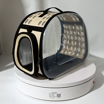 Gray and black pet carrier with a clear bubble window featuring paw prints and a mesh side for ventilation. - Image 11