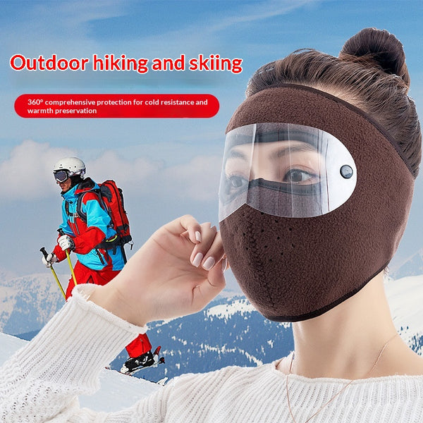 Black fleece winter cycling mask with clear windproof goggles, covering face, neck, and ears for cold protection.