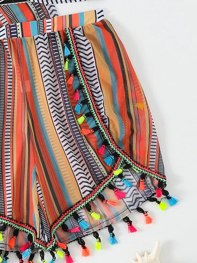 Four-piece swimsuit set with a colorful striped bikini, tassel shorts, and a matching kimono cover-up. - Image 10