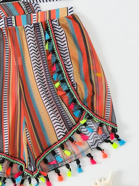 Four-piece swimsuit set with a colorful striped bikini, tassel shorts, and a matching kimono cover-up. - Image 10