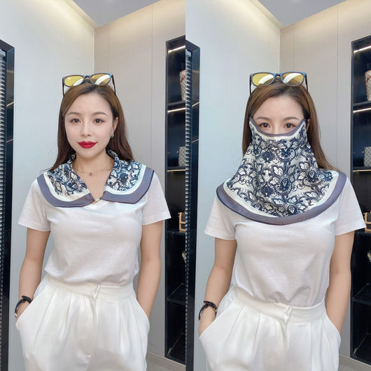 Female cream and black floral polka dot sun protection mask with ear loops, designed for eye corner protection. - Image 12