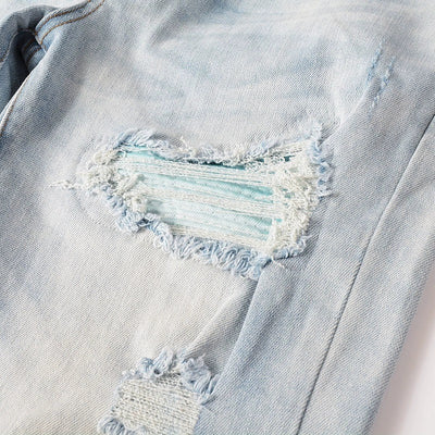 Jeans Azul Cielo Desgastado con Roturas Vintage para Hombre - Image 31