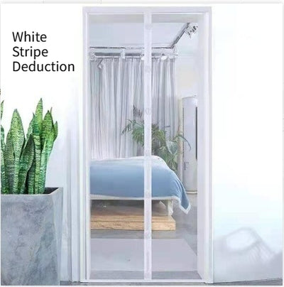 Black magnetic mosquito-proof curtain installed in a white doorway, with a puppy sitting in front of it. - Image 9