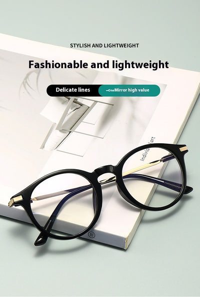 Dark purple round-frame anti-blue light reading glasses with silver-colored temples on a white background. - Image 16