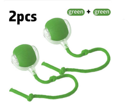 Two cat rolling ball toys, one red and one green, with clear plastic and knotted cords, on a white background. - Image 14