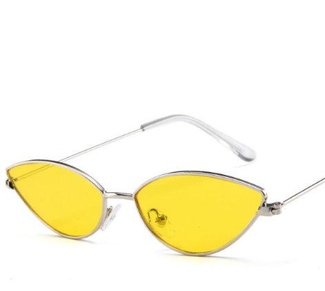Retro cat eye sunglasses for women with bright yellow lenses and a sleek silver-tone metal frame. - Image 6