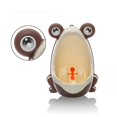 Green and orange frog-shaped children's urinal with large eyes and a spinning target for potty training. - Image 9