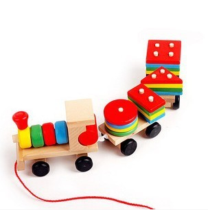 Wooden toy train with a locomotive and two carriages, each carrying colorful shape-sorting blocks. - Image 4