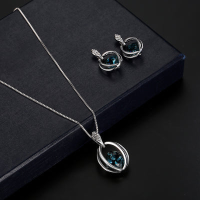 Silver-tone necklace and drop earrings set with blue cushion-cut crystals and clear accents, ideal for bridal wear. - Image 8