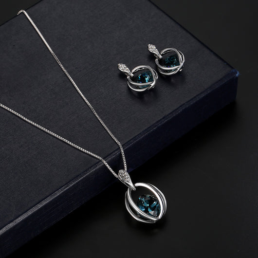Silver-tone necklace and drop earrings set with blue cushion-cut crystals and clear accents, ideal for bridal wear. - Image 8