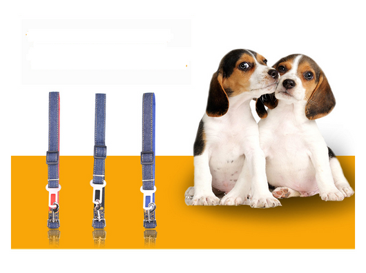 Dark blue denim pet car seat belt with yellow stitching, metal buckle, and plastic adjuster on a hanger. - Image 3