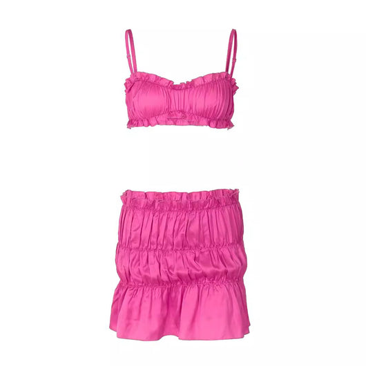 Fuchsia ruched tube top and matching pleated mini skirt set on a woman, perfect for summer. - Image 5