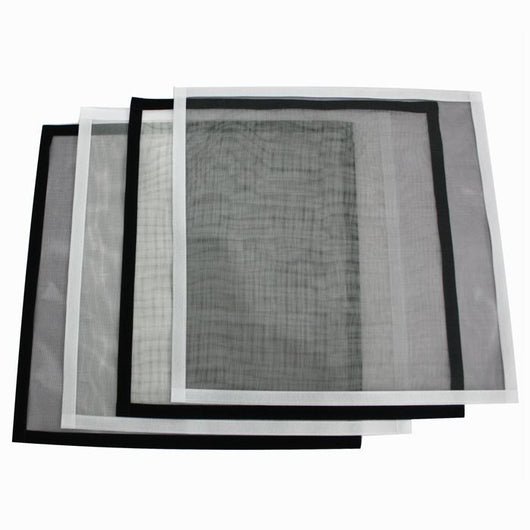 White mosquito screen applied to a window, with a hand gently pulling a corner to show its fine mesh texture. - Image 3