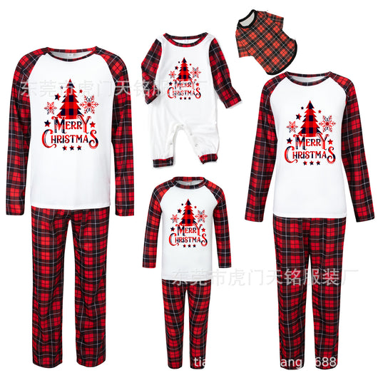 Family of four wearing matching green plaid Christmas pajamas with "Merry Christmas" and Christmas tree print. - Image 14