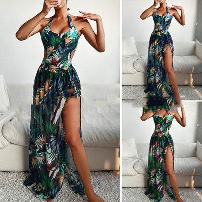 Yellow tropical print three-piece bikini set with halter top, high-waisted bottoms, and long cover-up skirt with high slit. - Image 2