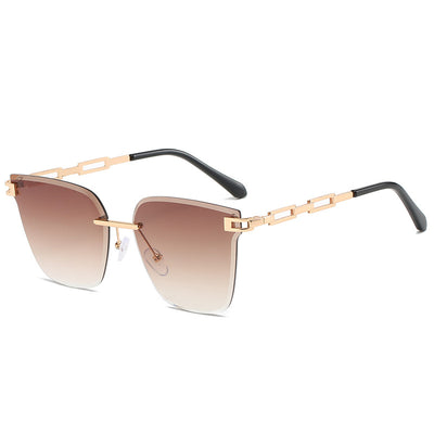 Frameless oversized square sunglasses with brown gradient lenses and gold-tone metal temples, featuring decorative black studs. - Image 4