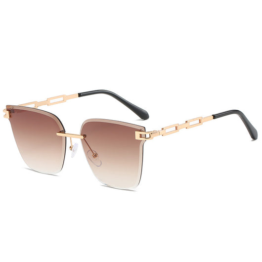 Frameless oversized square sunglasses with brown gradient lenses and gold-tone metal temples, featuring decorative black studs. - Image 4