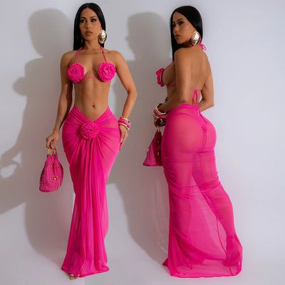 Blue three-piece bikini set with floral appliques on the triangle top, thong bottom, and matching ruched maxi skirt. - Image 20