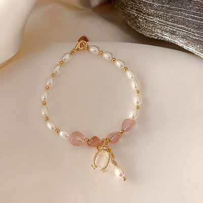 Pulsera de Perla Barroca Flor de Durazno Dorado - Image 2