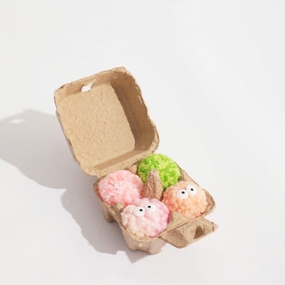 Assortment of soft, colorful yarn ball dog toys with built-in bells, featuring various patterns and textures. - Image 3