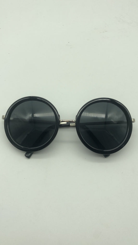 Big round sunglasses with black frames and dark lenses, featuring silver-colored temples. - Image 10