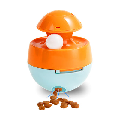 Orange and blue interactive pet food dispenser toy with multiple tiers and white balls, next to its black packaging. - Image 3