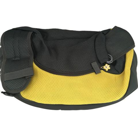 Green and black mesh pet carrier sling bag with a drawstring opening and a yellow flower-shaped zipper pull. - Image 4
