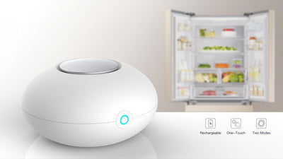 White mini ozone generator and air purifier with a round, compact design and a green indicator light. - Image 6