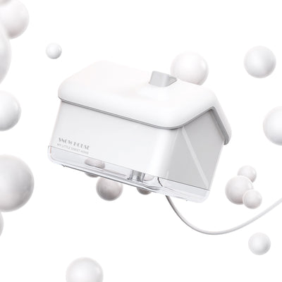 Pink and white house-shaped mini air humidifier with a clear base, a white roof, and a USB cable. - Image 8