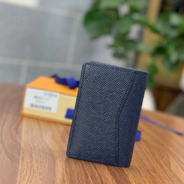 Billetera Minimalista de Cuero Genuino con Protección RFID y Múltiples Compartimentos