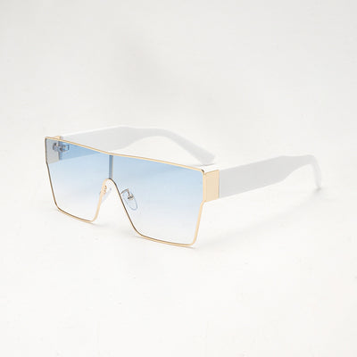 Oversized square sunglasses with a gold metal frame, dark gray lenses, and black plastic temples. - Image 3