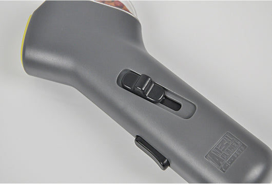 Dog Treat Launcher in retail packaging, a gray handheld device for dispensing snacks during training or playtime. - Image 10