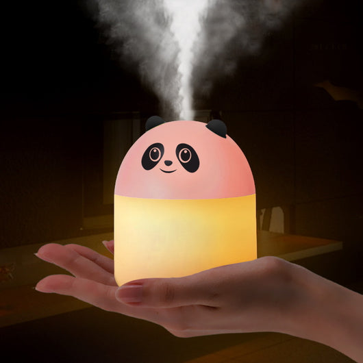 Panda-shaped humidifier and aromatherapy machine emitting mist, glowing red, held in a hand. - Image 10
