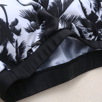 Black and white coconut palm print sports bikini set with a crop top and boy short bottoms for women. - Image 3