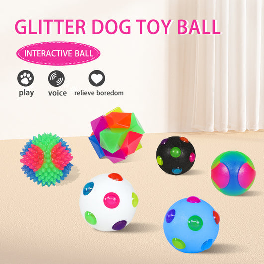 White 10cm TPR pet training ball with colorful luminous dots for small dogs.