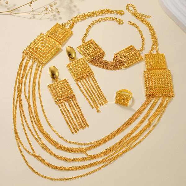 5-piece gold-plated jewelry set with multi-layered tassel necklace, matching dangle earrings, bracelet, and square ring.