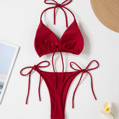 Red solid color two-piece bikini swimsuit with a halter tie-top and adjustable tie-side thong bottom. - Image 3